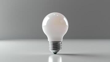 Light bulb on smooth minimalist surface. A smooth white light bulb stands upright on a flat surface, showcasing a minimalistic design and neutral background. photo