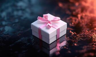 A white box with a pink ribbon on top photo