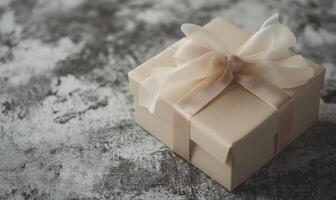 A brown box with a ribbon on top photo