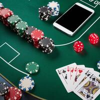 Green poker table with chips, dice, smartphone, and royal flush in digital gambling setting For Social Media Post Size photo