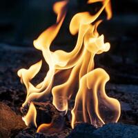 Vibrant flames in orange and yellow create intricate patterns against a dark background For Social Media Post Size photo