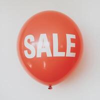 Red SALE balloon floating against white background, bold text in center For Social Media Post Size photo
