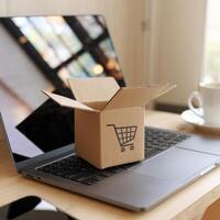 Laptop keyboard with shopping cart box, emphasizing online shopping theme For Social Media Post Size photo