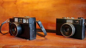 Retro Old camera stack of vintage books photo