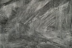 Abstract texture of gray surface with swirling patterns and depth photo