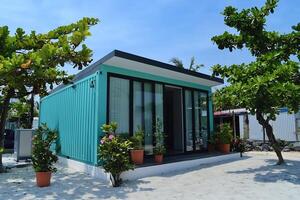 Compact Eco Friendly Tiny House in Lush Tropical Garden photo