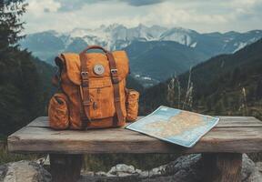 A rustic wooden bench holds a vintage style backpack and a folded map photo
