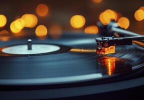 Vintage Turntable Playing Vinyl Record with Warm Bokeh Lights photo