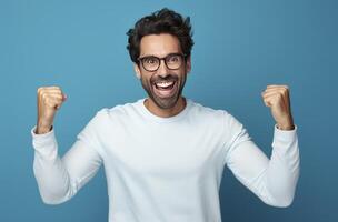 Joyful Man Celebrates Success, Triumphant Achievement, Happy Expression photo