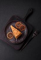 Piece of sweet layer cake Napoleon with custard photo