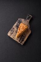 Piece of sweet layer cake Napoleon with custard photo