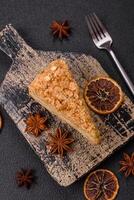 Piece of sweet layer cake Napoleon with custard photo