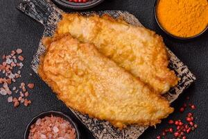 Grilled chicken or turkey chop with salt, spices and herbs photo