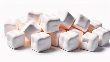 Close-up of a pile of white square marshmallows. photo