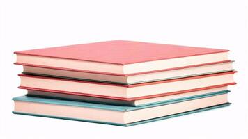 A stack of four books with red and blue covers. photo