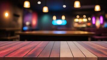 Wooden Tabletop with Blurred Background of a Cafe or Bar. photo