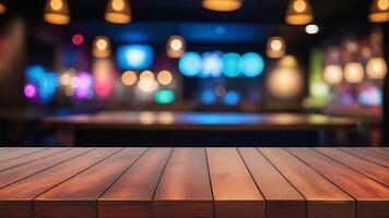 Empty wooden table with blurred background of a bar or restaurant. photo