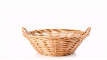 Empty woven wicker basket with two handles on a white background. photo