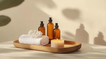 Natural beauty products are elegantly arranged on a wooden tray, featuring amber bottles, a soft towel, and a lit candle. The design emphasizes eco-friendliness and tranquility in a serene setting. photo