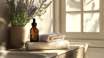 A sunlit room features a wooden table adorned with plush white towels, a brown glass dropper bottle, and a vase of fresh lavender. The setup reflects a commitment to eco-friendly beauty and wellness. photo
