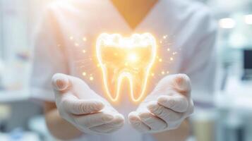 A dental professional showcases a glowing tooth symbol, representing advancements in oral health care. This moment highlights the integration of technology in dentistry for patient protection. photo