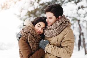 Winter Love. Cute Lovers Embracing Standing In Snowy Forest Having Date Outdoor. Copy Space, Panorama photo