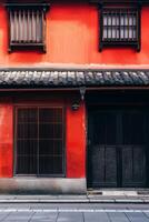 Traditional japanese architecture with red exterior and wooden elements photo
