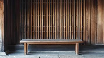 Wooden bench in front of traditional japanese lattice wall photo
