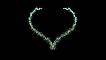 A heart is formed from illuminated particles on a black background video