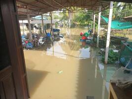 Severe flooding affects local community town market photography urban environment ground-level view nature's impact photo