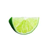 Close-up of lime on white background photo