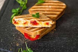 grilled fried bread toasts with filling inside photo