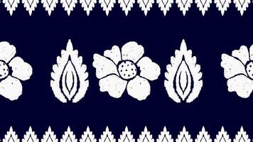 Design a seamless geometric fabric pattern of flowers. vector