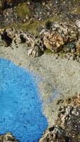 aerial view from flying drone of rocky island in Atlantic ocean video