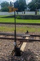 Railway switch at Ambarawa Railway Museum, showcasing historical railway infrastructure and technology. Indonesia, 17 November 2024 photo