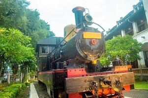 The image showcases the historic Steam Locomotive Monument C 23 01 at Lawang Sewu, a significant heritage site in Indonesia, 16 November 2024 photo