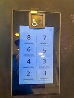 touch dashboard of a modern elevator, for calling the elevator in the polyclinic photo
