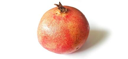 Fresh Pomegranate fruit or buah delima isolated on white background photo