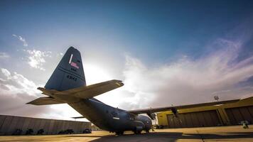 4K Footage Beautiful C-130 aircraft Fast motion with run cloud sky scenery, amazing colourfull cloud scenery sky background video