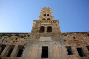 Akko Israel 2024 . city clock on the tower photo
