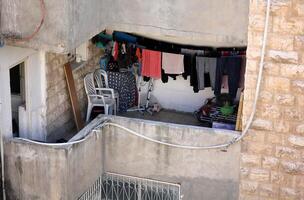 washed clothes hanging on a line photo