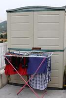 washed clothes hanging on a line photo