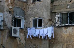 washed clothes hanging on a line photo