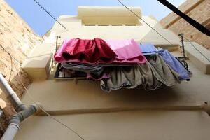 washed clothes hanging on a line photo