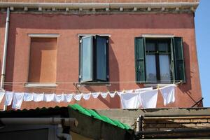washed clothes hanging on a line photo