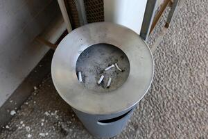 cigarette butts in an ashtray photo