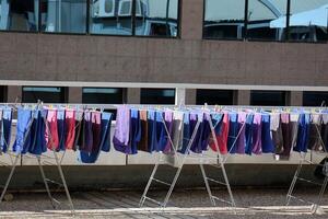 washed clothes hanging on a line photo