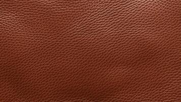 Deep mahogany leather with bold grain patterns and a natural sheen, ideal for luxury branding, decorative backgrounds, and premium product visuals. photo