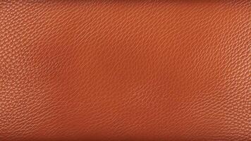 A vibrant orange-brown leather with bold grain patterns, perfect for rustic design projects, modern branding, and decorative backgrounds. photo