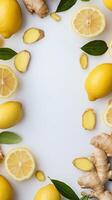Fresh lemons and ginger arranged on a white surface for a natural food display photo